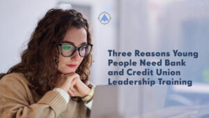 The blog title about credit union leadership training for young people with an image of a younger person looking at a laptop screen.