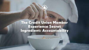 The blog title about credit union member experience over an image of a chef adding salt to a bowl of food.